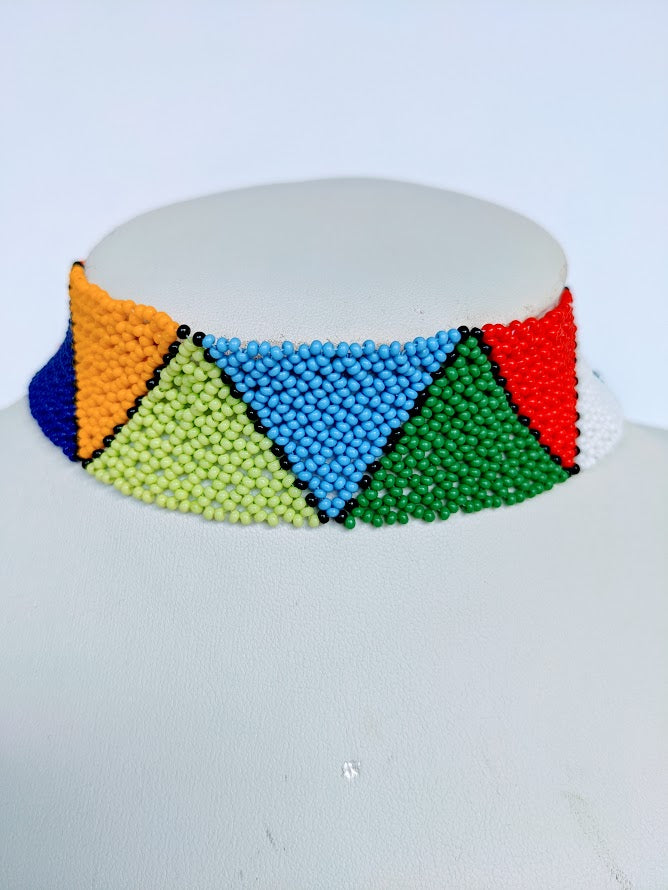This Necklace is handmade and will be a perfect addition to your outfit. Crafted with glass bead with adjustable ball and loop closure. The choker is about 40 cm long.