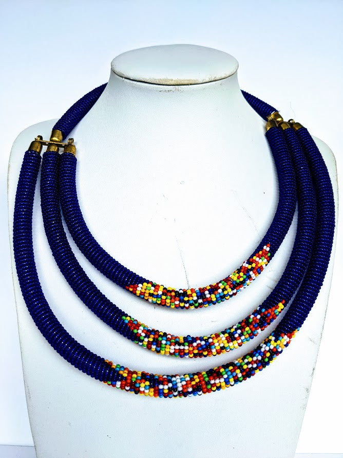 Three beautiful necklaces in one. Hand crafted using glass beads. Approximately 40 cm long