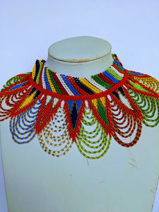 This colorful African necklace will make a difference in your outfit. It is approximately 53 cm long. 