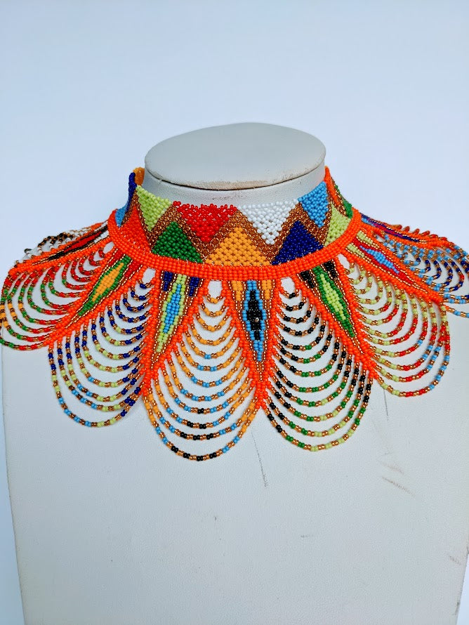 This colorful African necklace will make a difference in your outfit. It is approximately 53 cm long. 