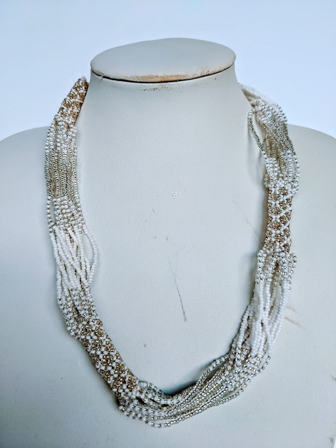 This Necklace is handmade and will be a perfect addition to your outfit. Crafted with glass bead with adjustable ball and loop closure. 